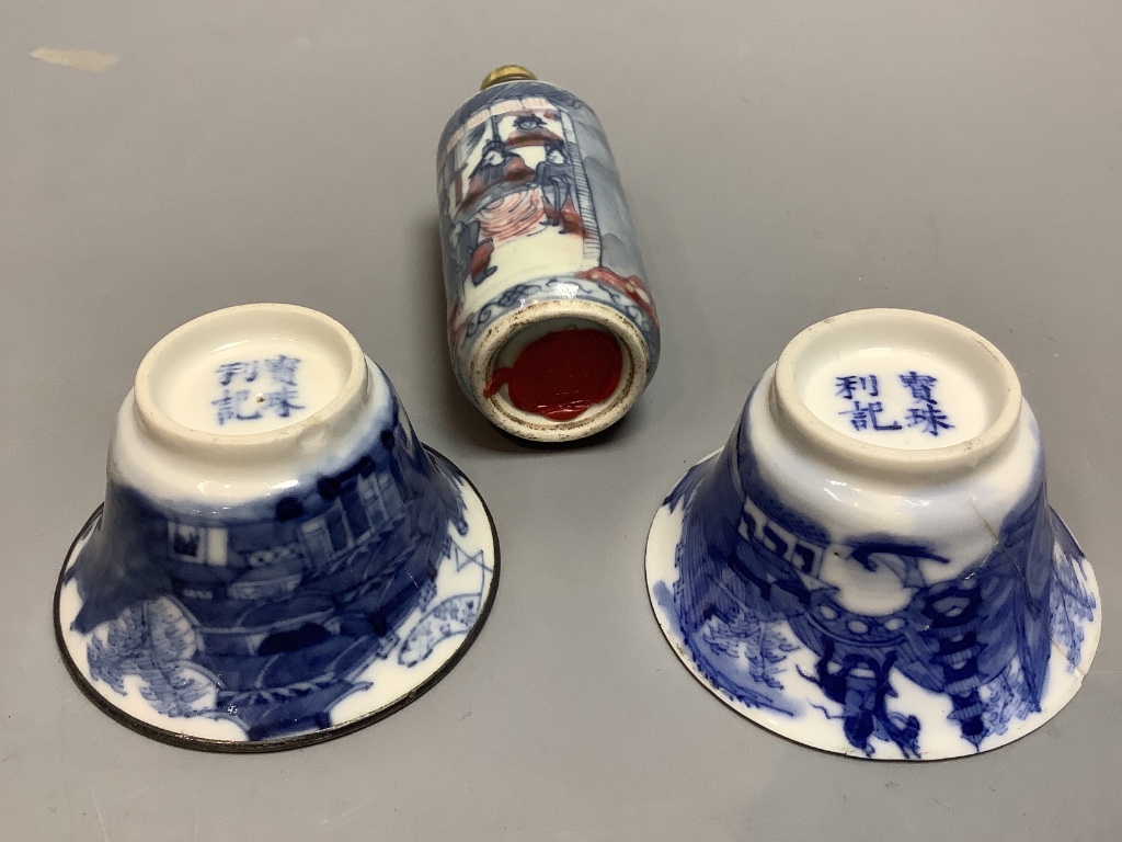 Two 19th century blue and white Chinese tea bowls and a 19th century snuff bottle, 9cm.